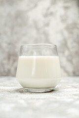front view a glass of milk on isolated background with copy space
