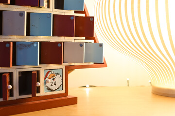 Advent calendar with open doors in tradition way for kids to count down to christmas day
