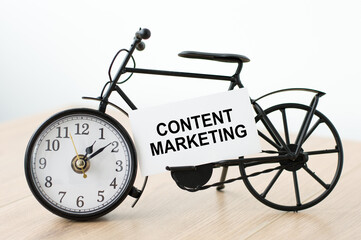 Content marketing.Content marketing card with information on watch isolated on table
