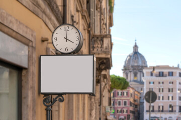 Fototapeta na wymiar Blank billboard with place for your message text on the avenue in the center of the capital of Italy