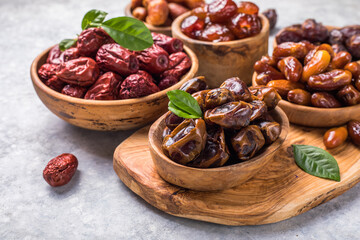 Top view of sweet dried dates (fruits of date palm Phoenix dactylifera). Bright saturated color and...
