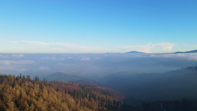 Aerial footage of Beskidy Mountains with Babia G&oacute;ra on horizon.