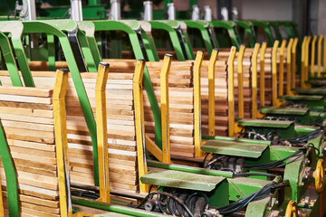 conveyor line for the production of planks in a woodworking plant