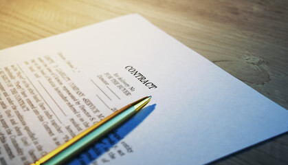 Business contract and pen on the table. Business and finance concept. Selective focus.
