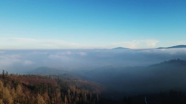Aerial footage of Beskidy Mountains with Babia G&oacute;ra on horizon.