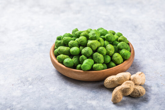 peanuts snack for beer, wine, party bar. Salted peanuts, in coconut glaze, green vasabi