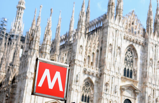 metro or underground sign at Milan cathedral in Italy, Europe, selective focus on metro sign