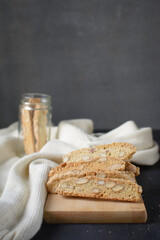 Fototapeta na wymiar Almond biscotti or cantucci on a chopping board