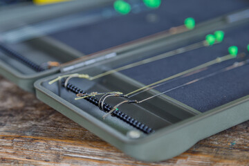 Fishing tackle on a wooden table.Carp fishing.carp fishing tool.