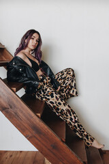 Beautiful young woman at home