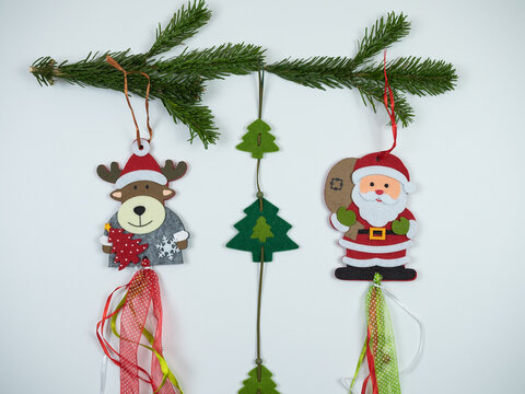 Christmas composition. Christmas decoration and fir tree branches on white background. Flat lay, top view.