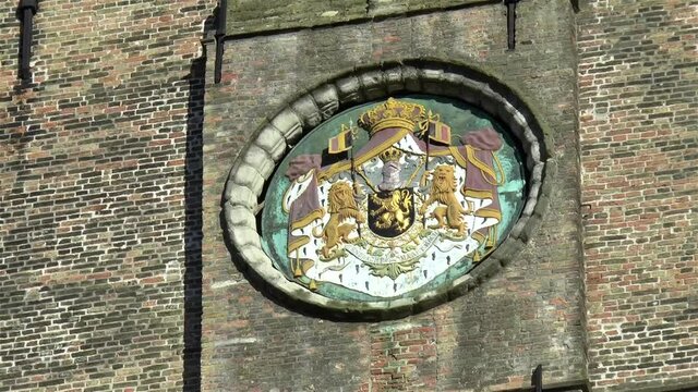 Coat of Arms, medieval architectural detail on the Belfry of Bruges, Belgium.