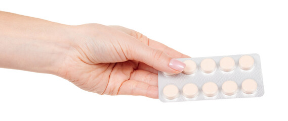 Hand with pills in blister isolated on white background.