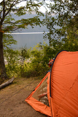 armed tent on the shores of the lake, neuquen, villa la angostura