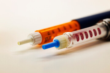 Insulin pen, injector pen on white background 