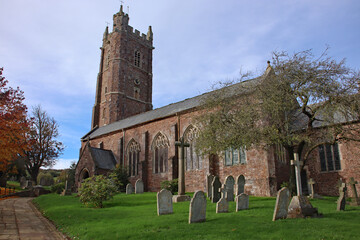 Fototapeta premium St Disen's Church and part of the cemetery in Bradninch, Devon