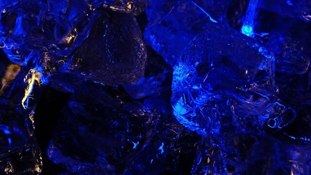 Ice Cubes Rotate On An Axis. 4K Color Yellow And Blue Wallpaper