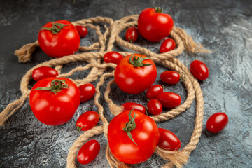 front view fresh cherry tomatoes with ropes on dark background food ripe photo salad