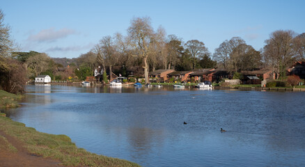 Fototapeta na wymiar The River Thames near Cookham and Cock Marsh, Berkshire, UK, photographed on a cold, sunny winter's day.