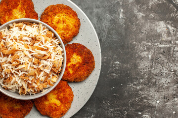 top close view fried cutlets with cooked rice on dark background food meat rissole