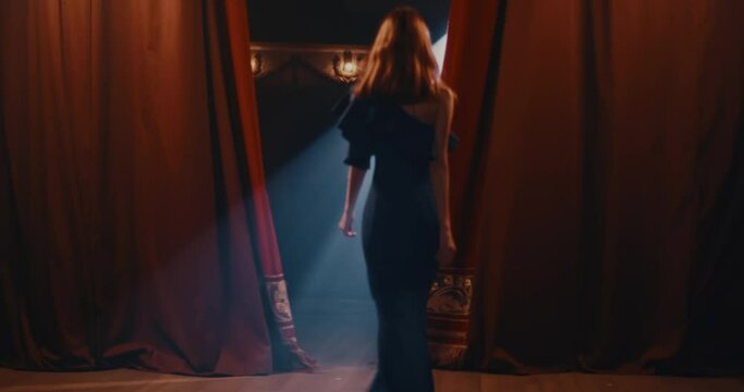 Anonymous actress walking on stage