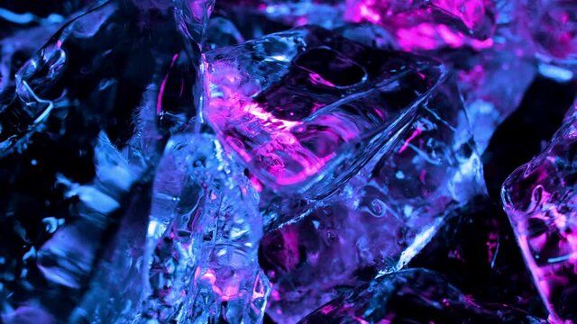 ice cubes with blue and pink highlight. beautiful abstract wallpaper with neon lights