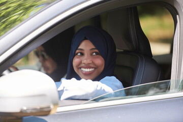 Arabic Woman Couple Traveling By Car