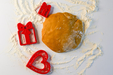 valentine's day homemade baking food concept, raw dough and cutter dish heart shape for making...