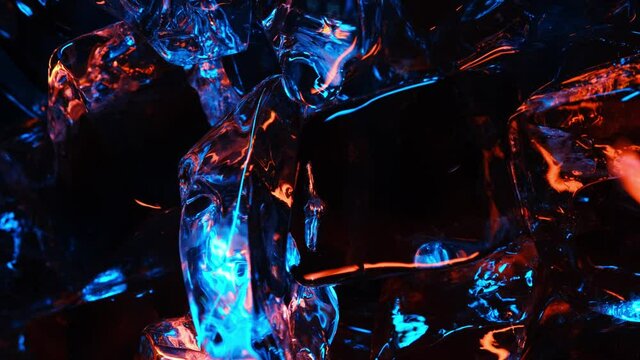 Ice cube on color fire light. abstract wallpaper
