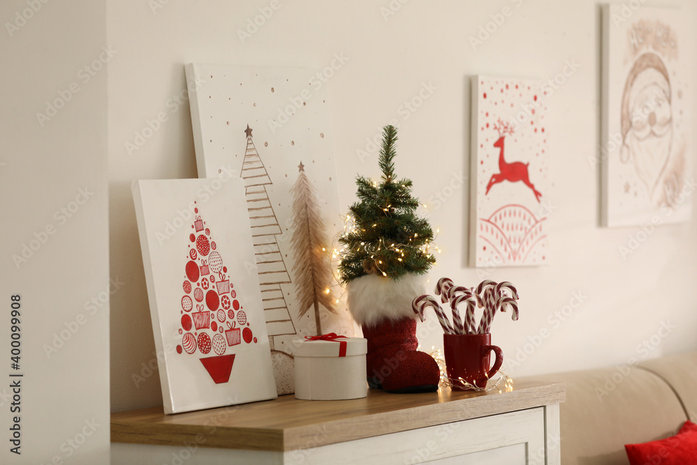 Canvas Prints Beautiful Christmas pictures on chest of drawers indoors. Interior design