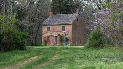 Fototapeta na wymiar Abandoned Brick House in Nature