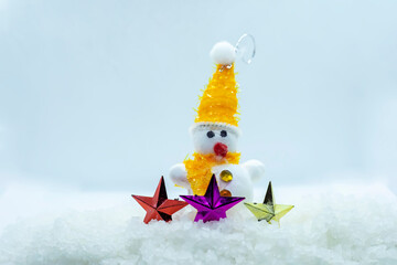 Merry christmas and happy new year greeting card. Cheerful snowman standing in the winter with the...