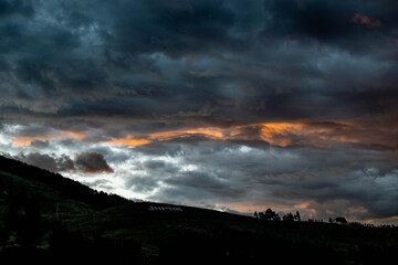 cloudy sky in the middle of the mountains
