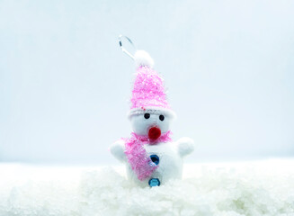 Happy snowman standing in winter christmas landscape. Merry christmas and happy new year greeting card. Copy space.
