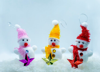 Merry Christmas and happy New Year greeting card with copy-space.Many snowmen standing in winter Christmas landscape.