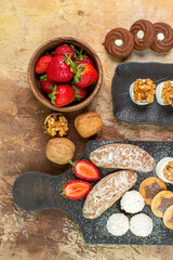 top view yummy sweets with fruits candies and cookies on the wooden desk sweet sugar biscuit