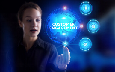 Business, Technology, Internet and network concept. Young businessman working on a virtual screen of the future and sees the inscription: Customer engagement
