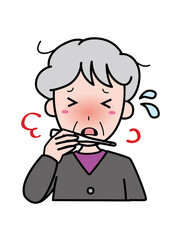 発熱し体温計を見て困っているおばあさん