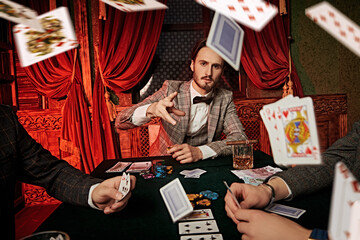 gambler throws cards