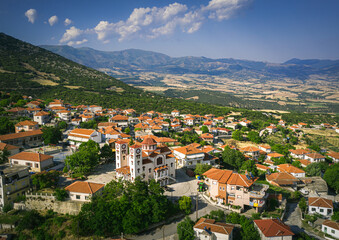 Fototapeta na wymiar Sarantaporo village, church near the village aerial vie, Greece