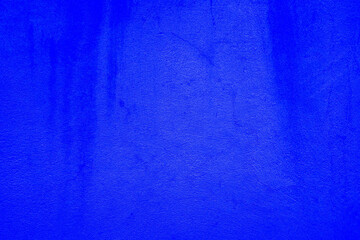 Abstract grunge decor. Beautiful dark blue stucco wall background. Space for designing and inserting text.