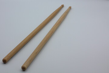 Percussion drumsticks on a white background.