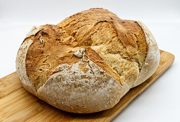 Loaf of Apulian Bread. Italian Pane Pugliese, crunchy on the outside and soft on the inside, perfect to be enjoyed with cold cuts and cheeses.
