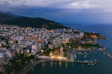 Aerial panoramic view of Volos city at twilight. Magnesia - Greece. - 400126177