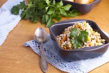 barley barley stewed cereals with vegetables carrots, onions, pumpkin and aromatic spices