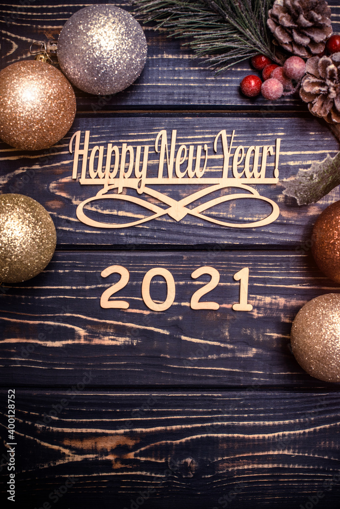 Wall mural happy new year 2021 on wooden brown background