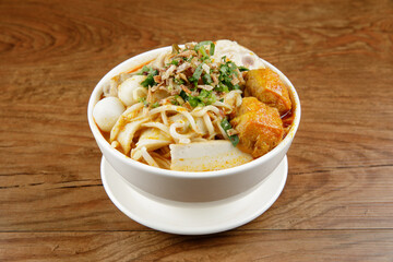 a bowl of curry noodle