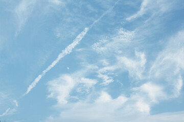 closeup of chemtrail on blue sky background