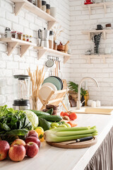 Close up of table with green vegetables in the kitchen