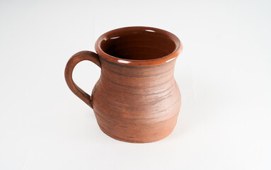 Pottery Craft, ceramic product with your own hands, made on a Potter's wheel, isolated on a white background